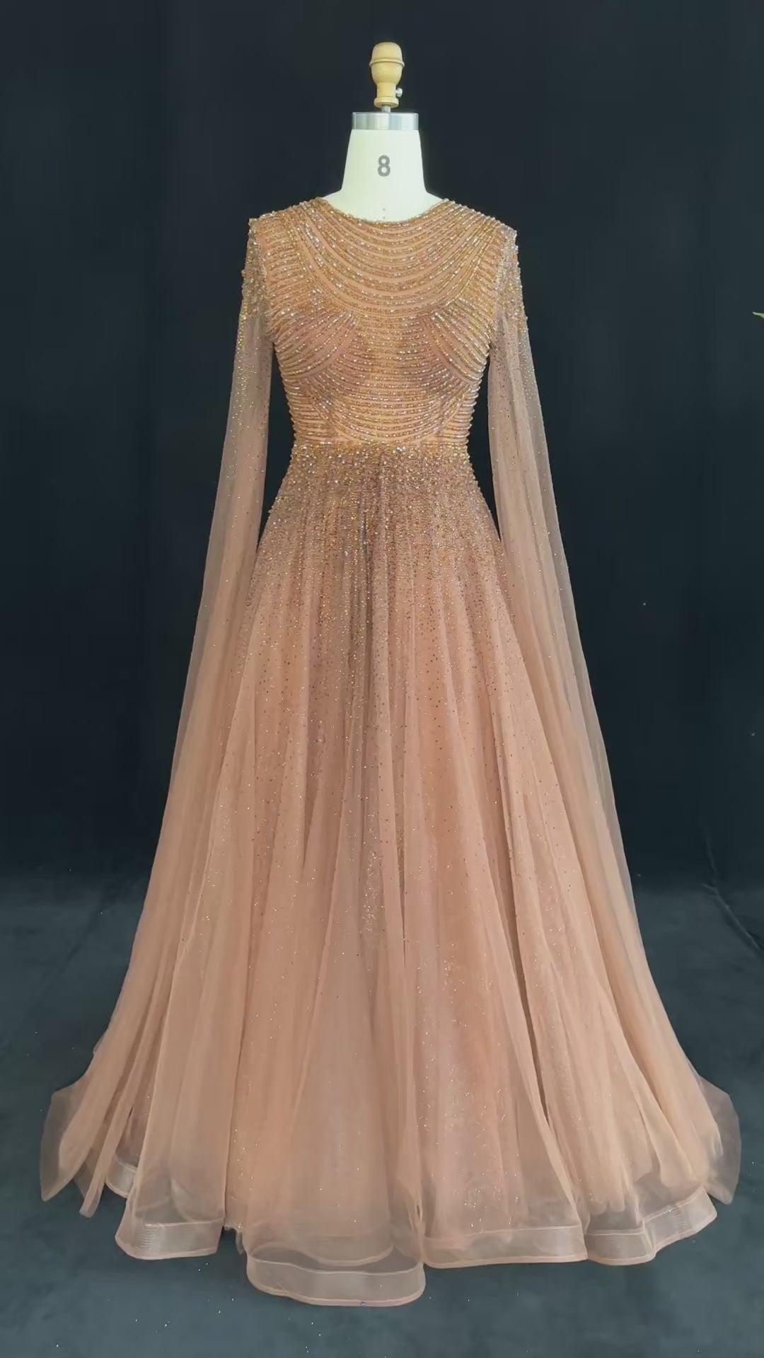 Load video: Sparkling Beaded A Line Evening Gown Long Cape Sleeves Glitzy Prom Dress SS059