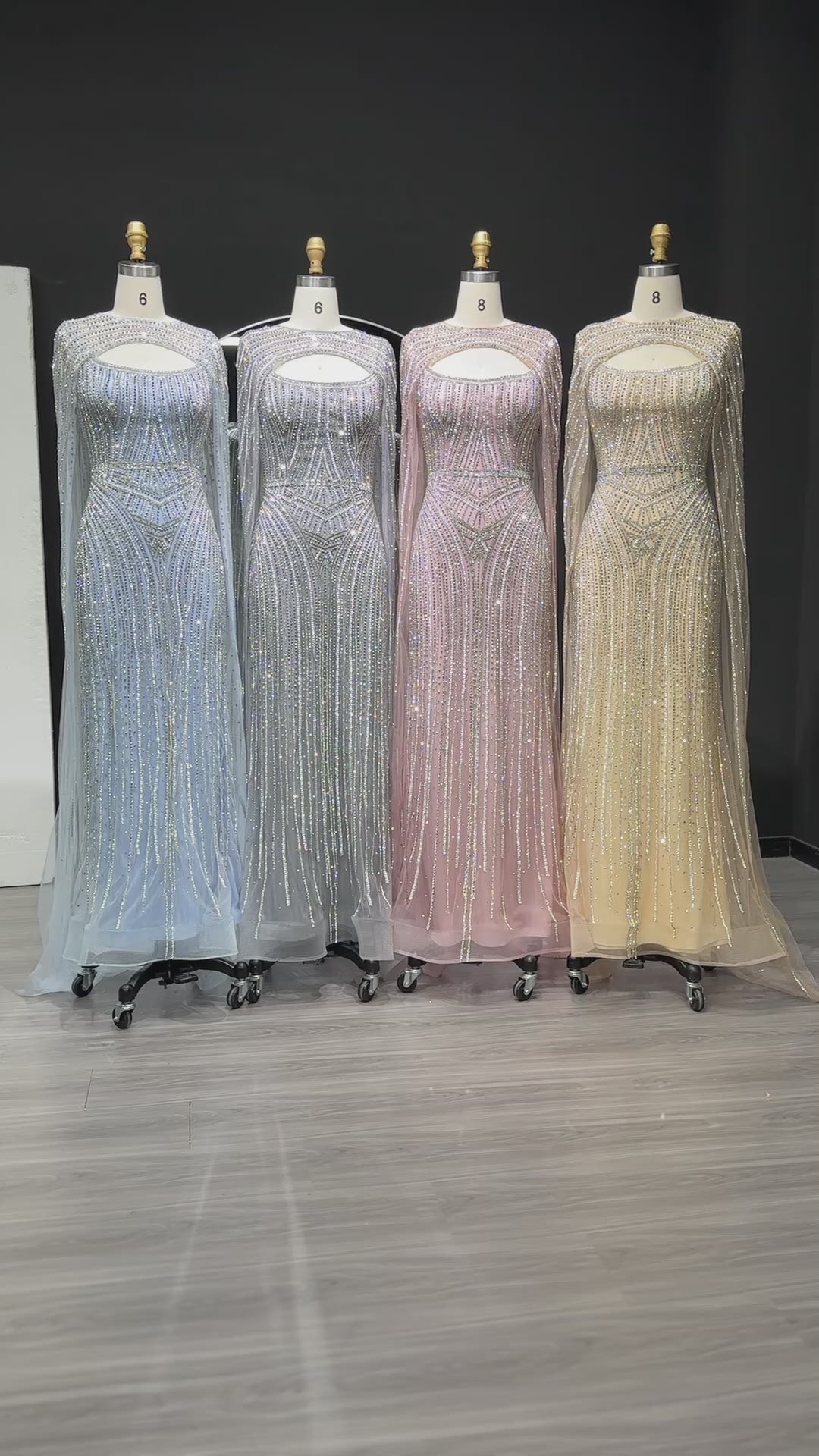 Load video: Glamorous Light Blue Beaded Prom Dress with Cape Overlay and Keyhole Neck SH312