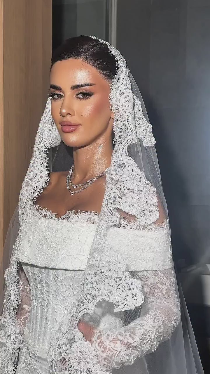 Load video: White Off the Shoulder Long Sleeve Lace Bridal Dress with Train SW674