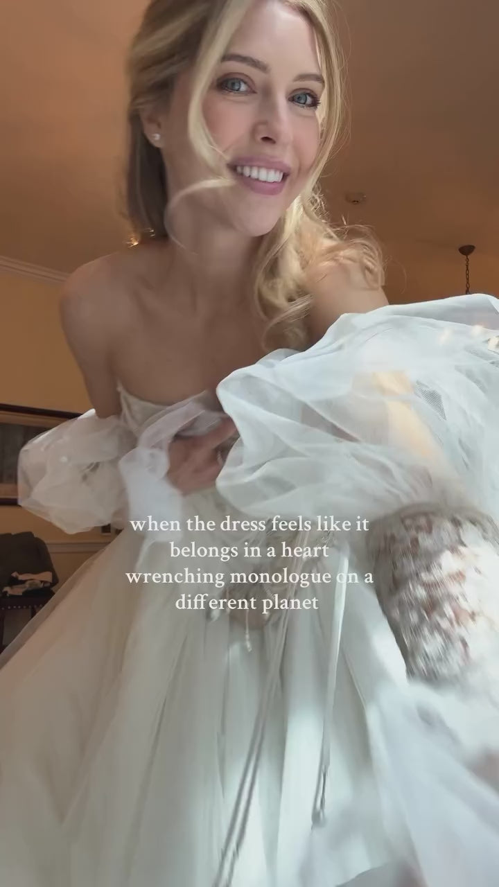 Load video: White Pearl Beaded Corset Wedding Dress with Detachable Puff Sleeves SW663