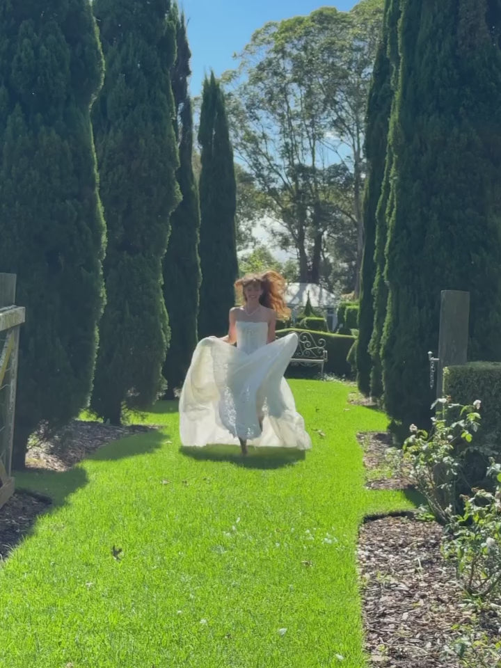 Load video: Glamorous Off White All Over Lace Strapless Floor Sweep Train Wedding Dress SW727