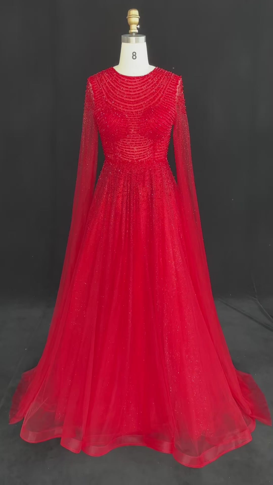 Load video: Sparkling Beaded A Line Evening Gown Long Cape Sleeves Glitzy Prom Dress SS059
